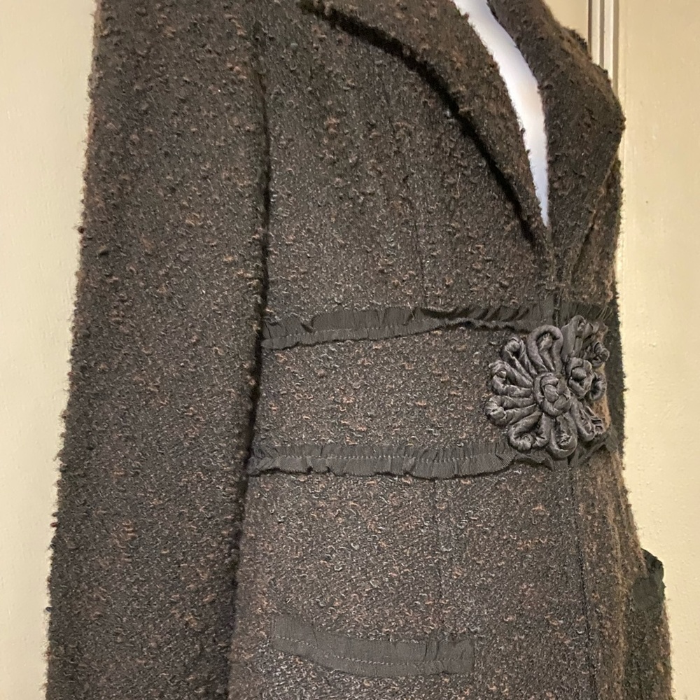 Nanette Lenore mid length jacket with wide sleeve.